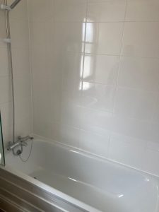finished bathroom with new bath